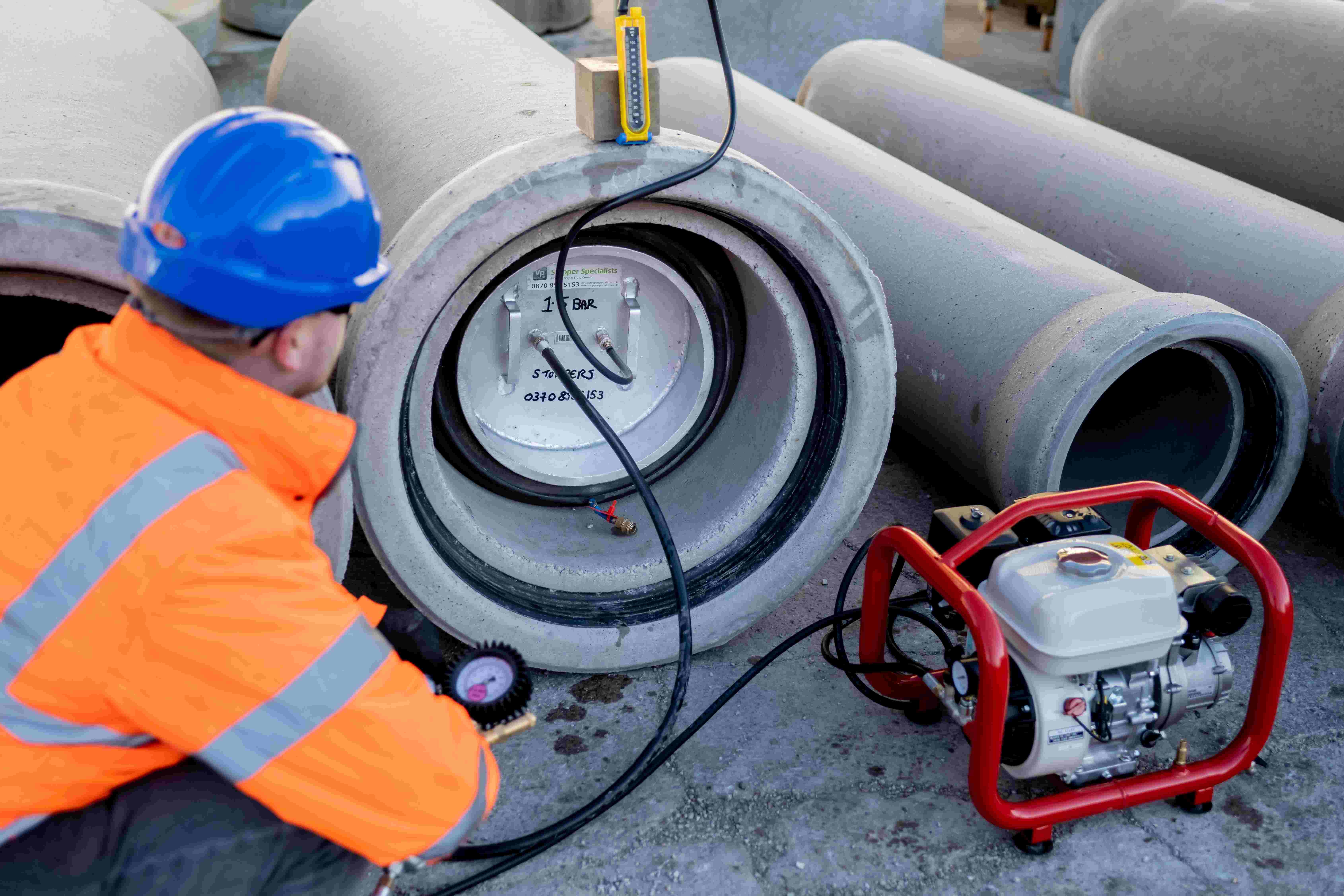 Groundforce worker using a pressure testing system